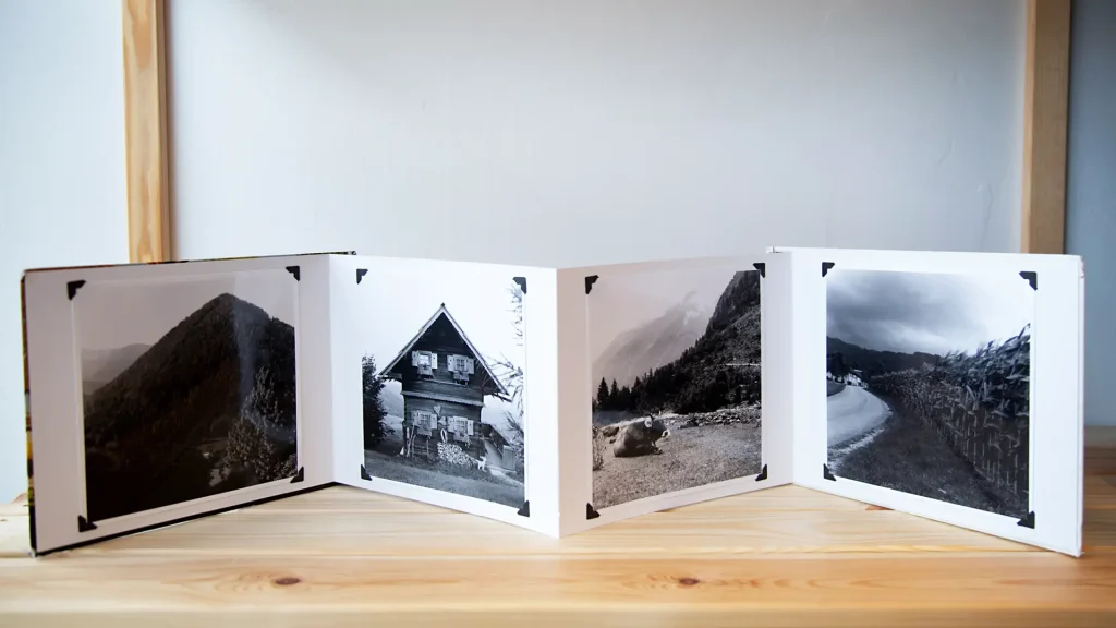 four prints in a book 