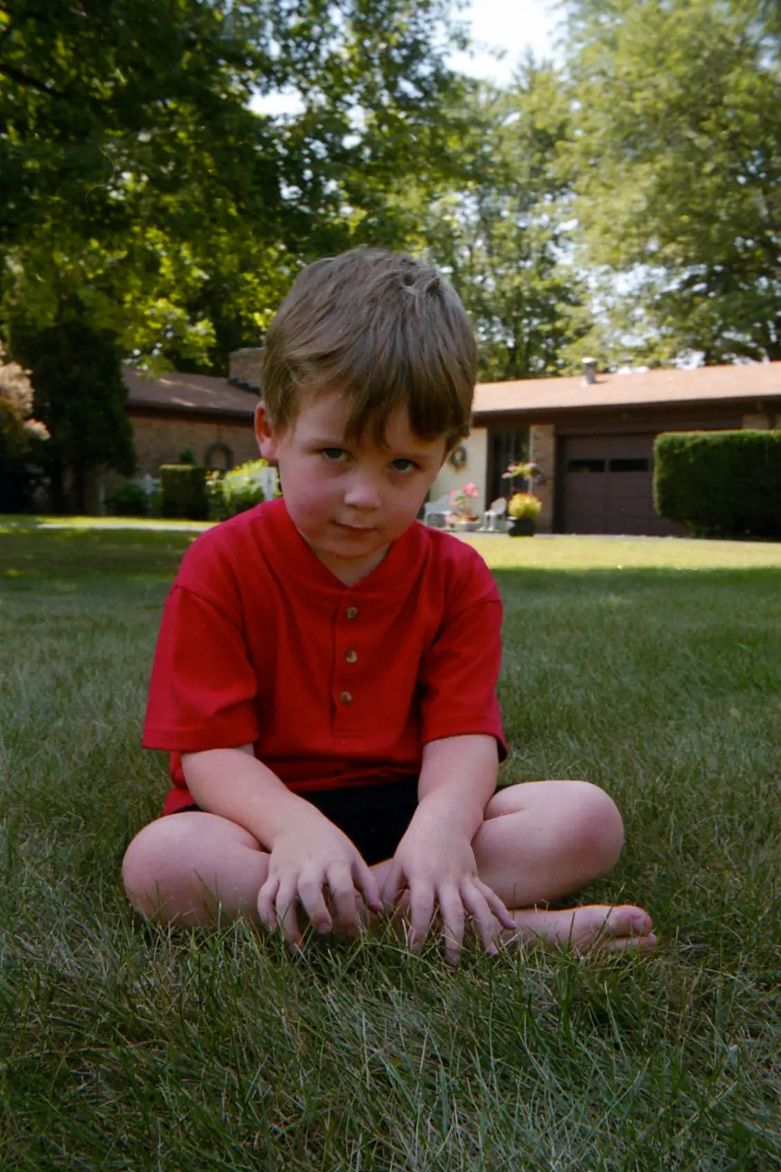 Older son in the grass