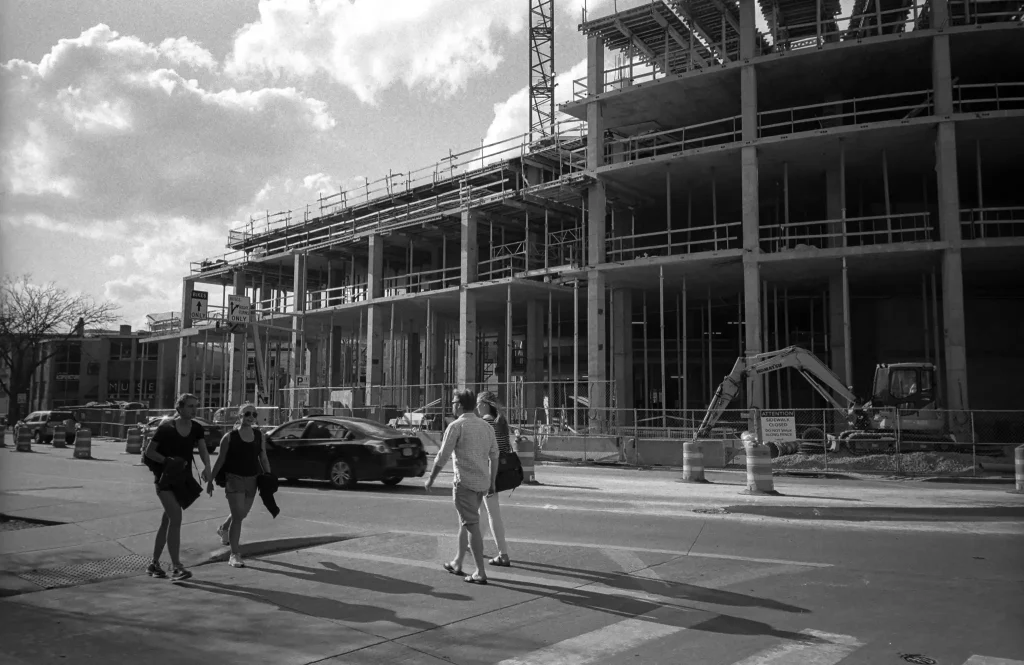 Photo of people and construction on University Avenue in Madison,WI.