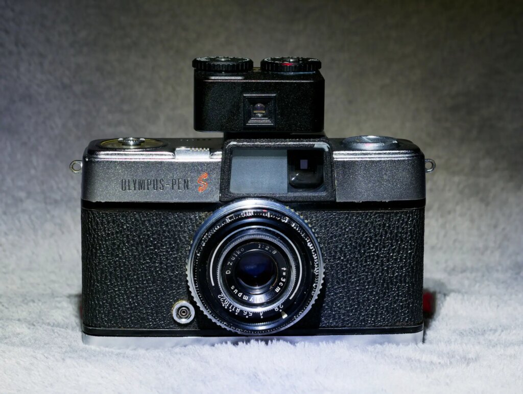 TTArtisan Lightmeter on top of Olympus Pen S camera