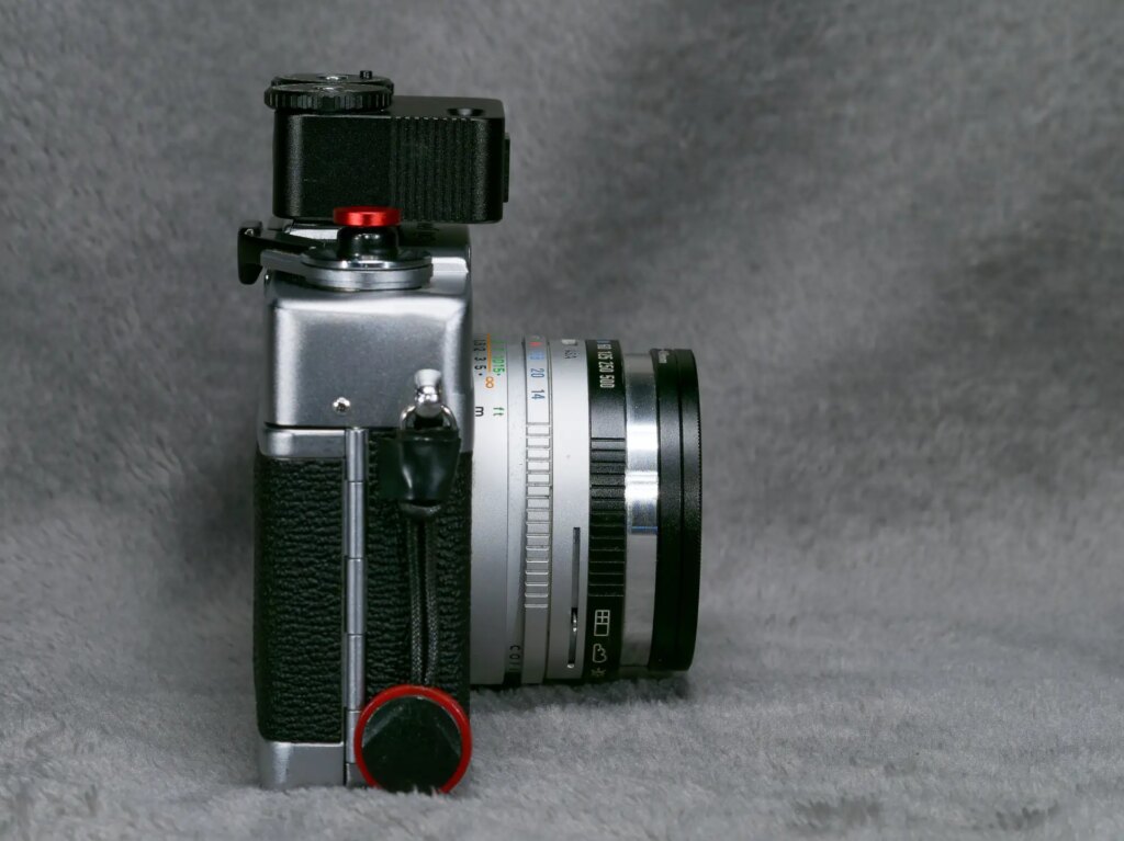 TTArtisan Lightmeter on top of Canonet QL17ii Camera