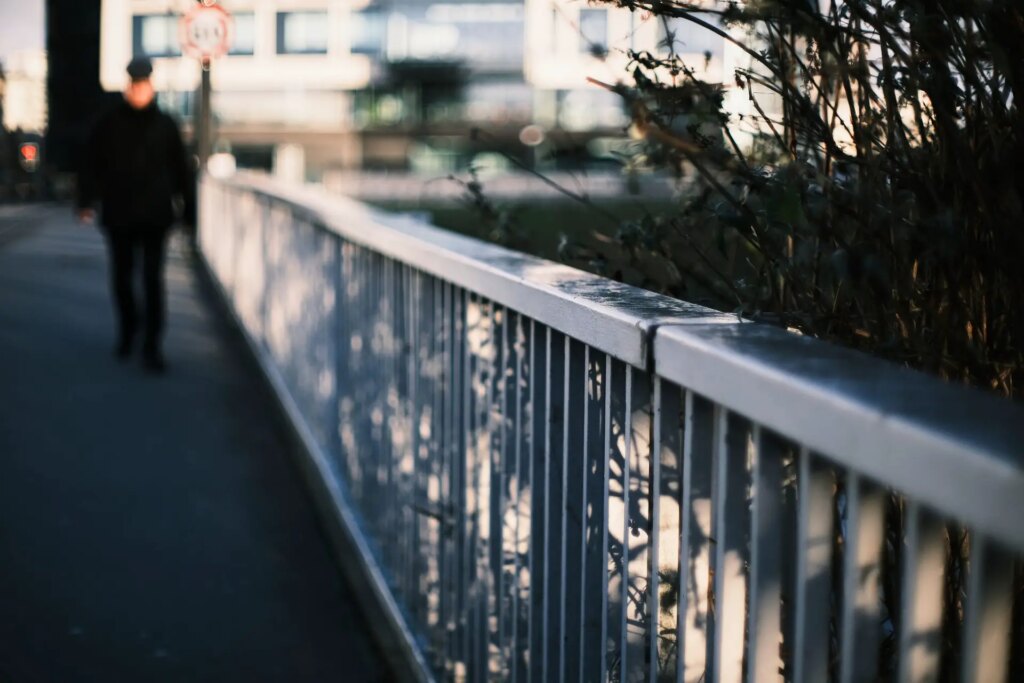 Sample image taken on the 35mm F0.95 lens - man crossing bridge