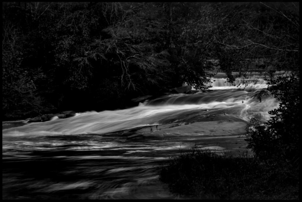 A section of Cedar Falls, on the Reedy River in Greenville, South Carolina. Nikon FG, Nikon Zoom 75-150 f/3.5 with polarizing filter. Exposed for 2 secs. at f/16.