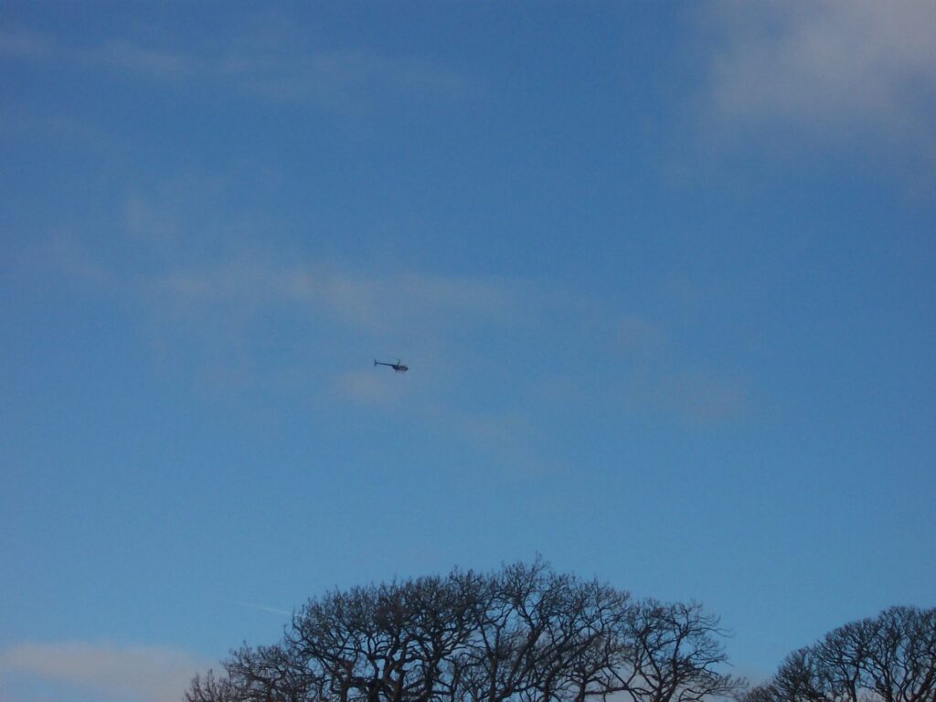 blue sky with heliecopter