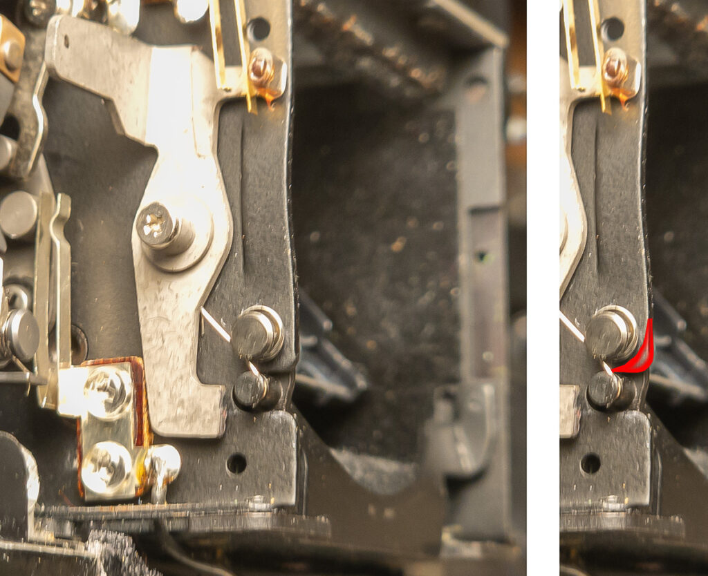 Manual stop-down lever, also showing the corner that has to be filed away.