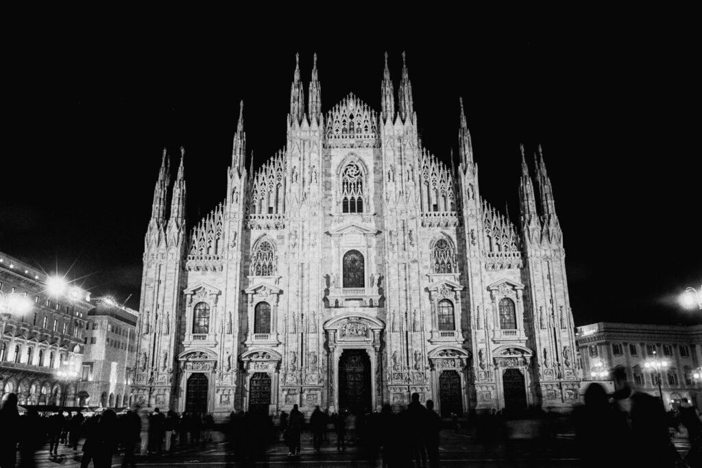 A long exposure of the Milan Cathedral at night with a Nikomat FTn and Kodak Tri-X