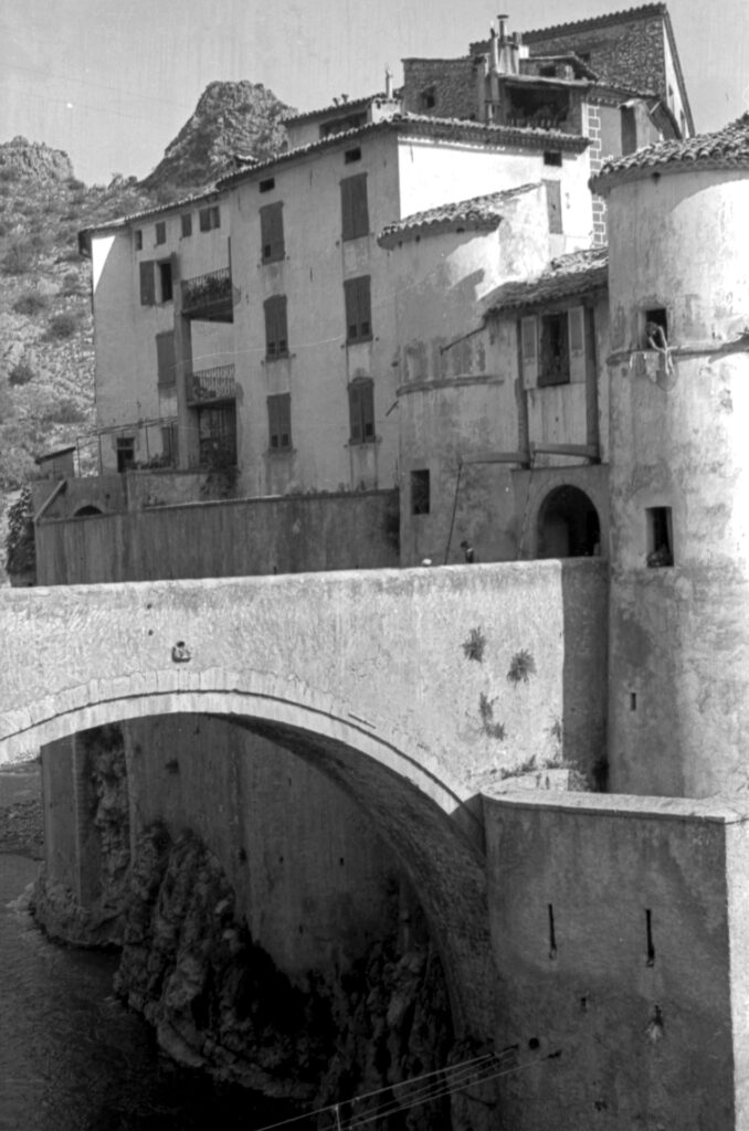 Black and white image of Entrevaux in the Alpes-de-Haute-Provence, France.