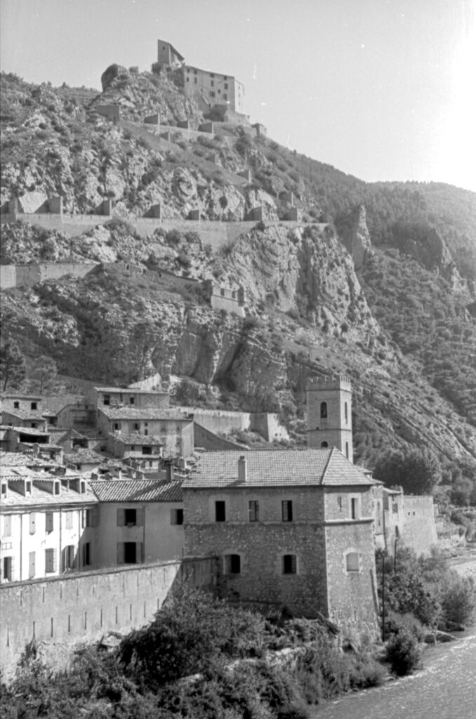 Black and white image of Entrevaux in the Alpes-de-Haute-Provence, France.