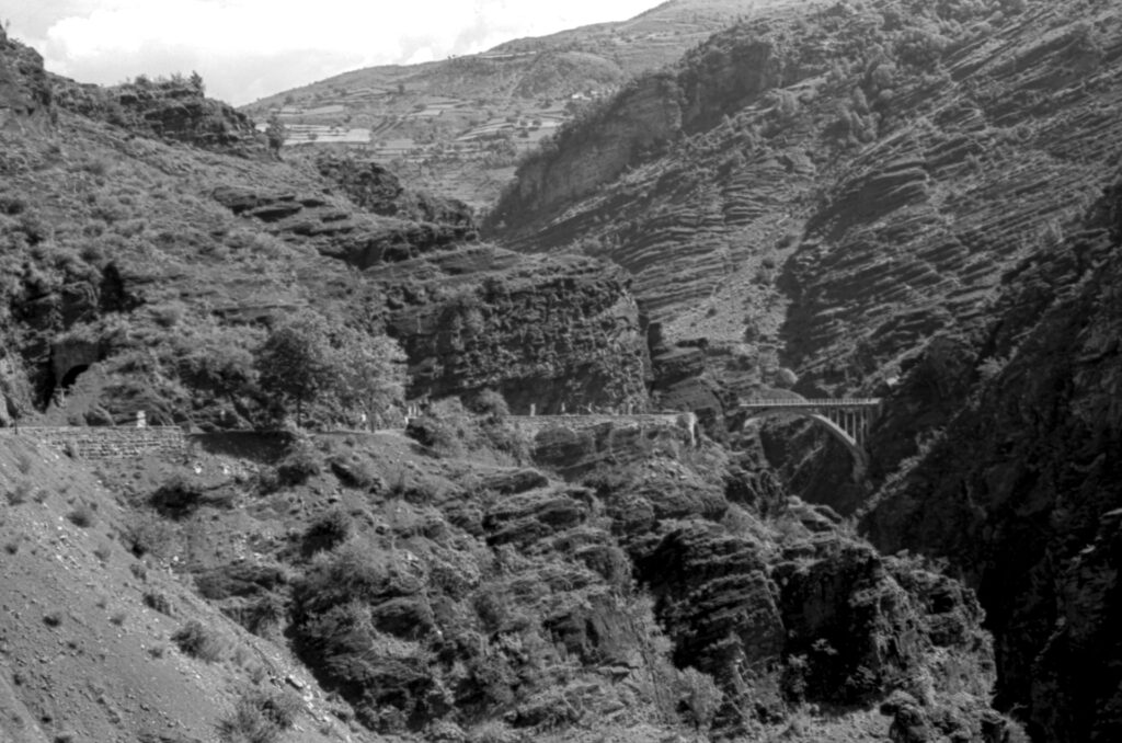 Black and white image of the Pont de la Mariée, Gorges de Daluis, France.