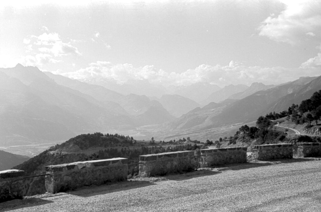 Black and white image of a mountain road in the Durance valley, France.