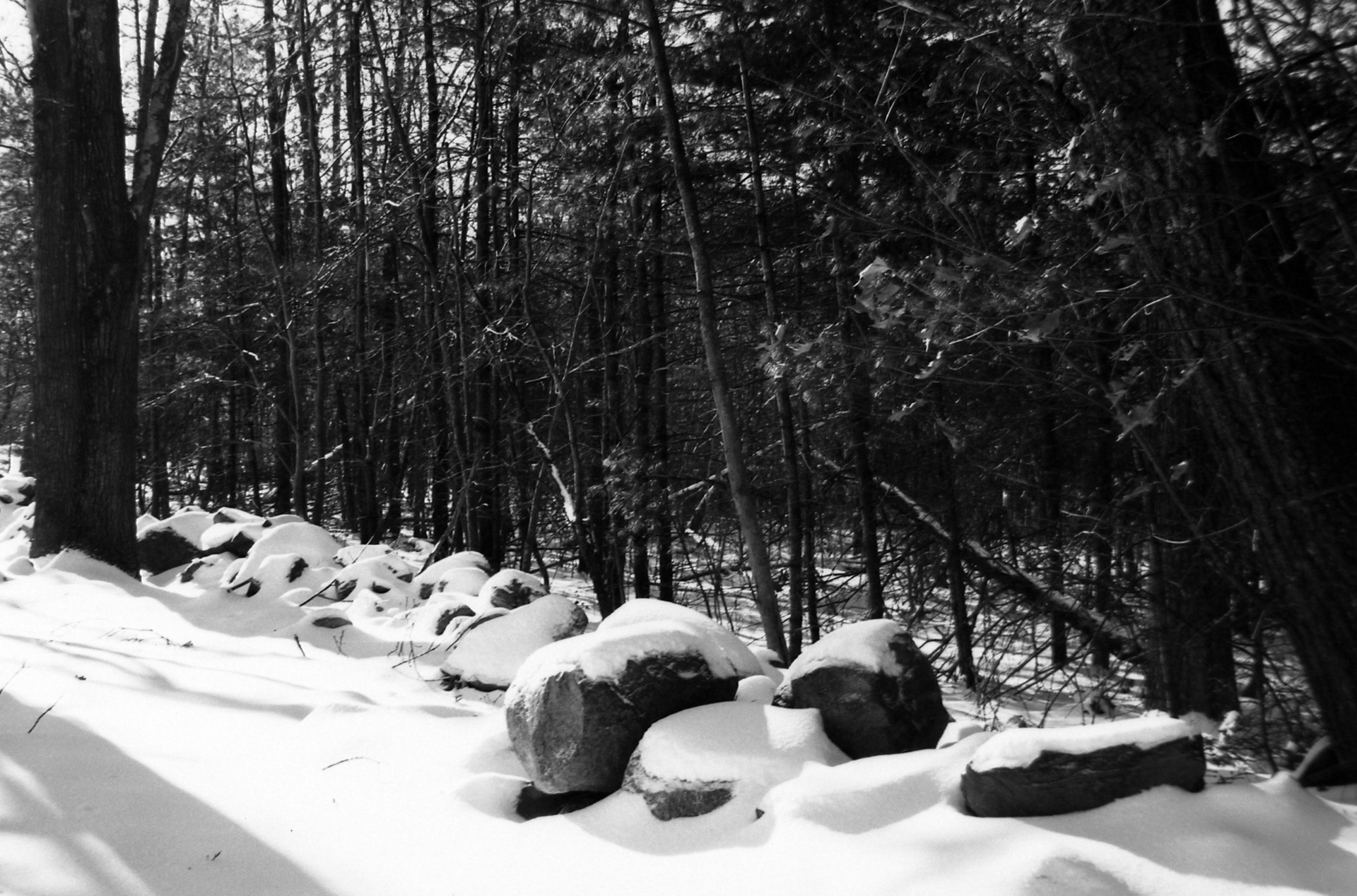 Old rock wall and snow