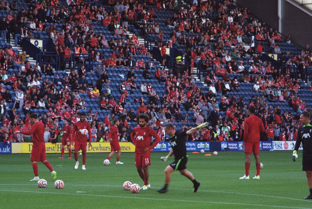 Mo Salah warming up for Liverpool FC at Deepdale. We can also see the coach and Joe Gomez. Shot on Canon z155, Portra 800