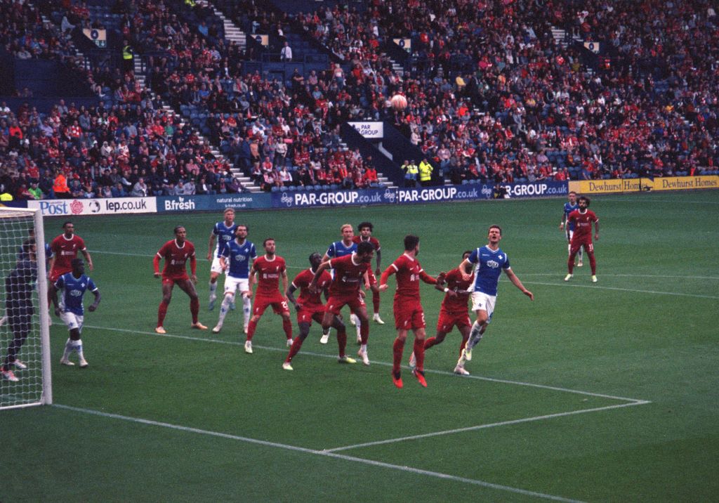Liverpool players defend against a Darmstadt 98 header. Shot on Portra 800, Canon z155