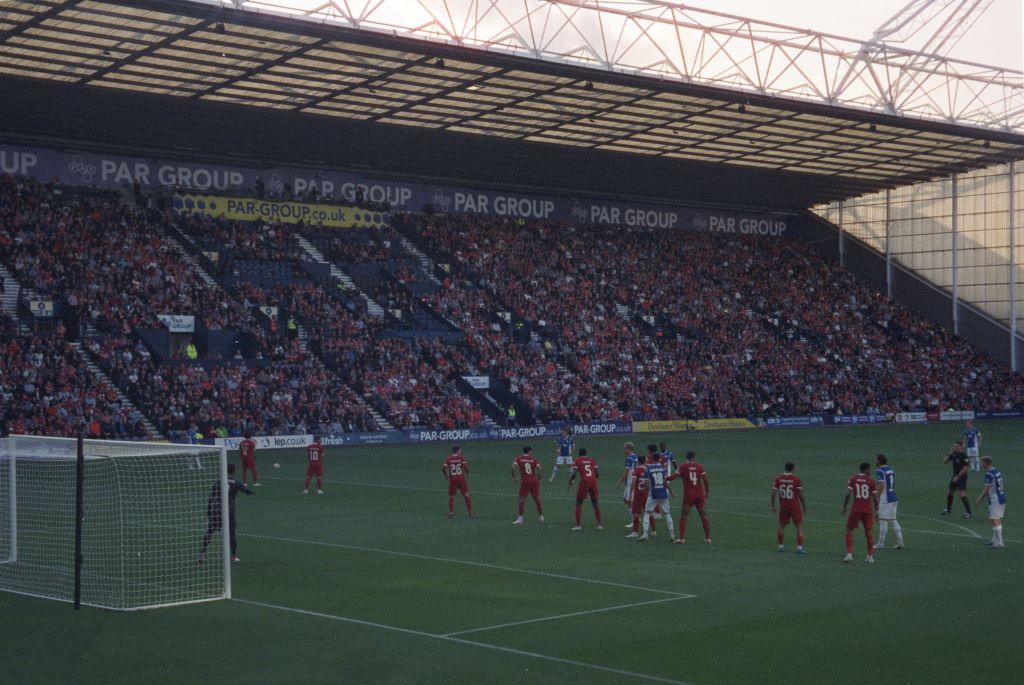 Liverpool FC players organise the defensive wall before a free kick from Darmstadt 98 at Deepdale. Portra 800, Canon z155.