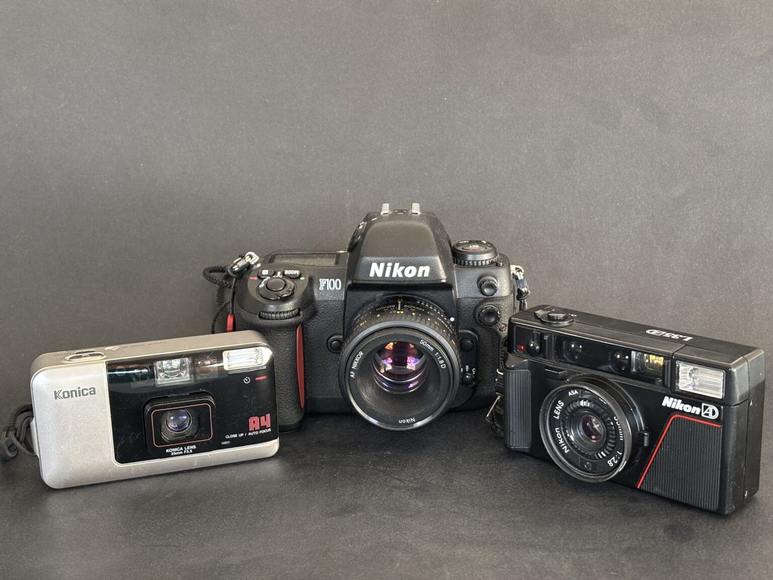 Nikon L35AF vs Konica A4 vs Pentax PC35 AF-M vs Nikkor 50mm f/1.8D - 35mmc