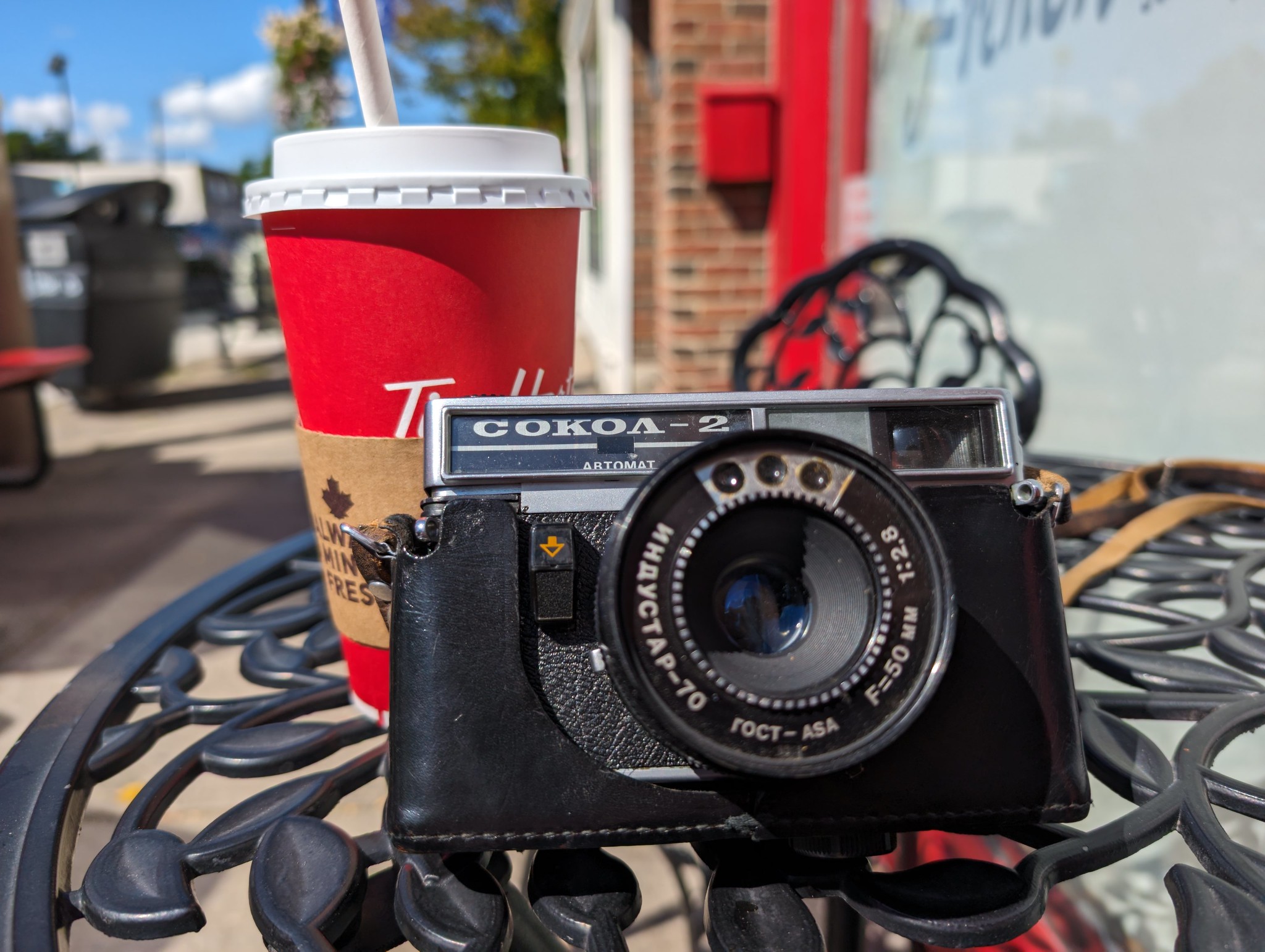 The Socol 2 Automat camera on the table of a street cafe