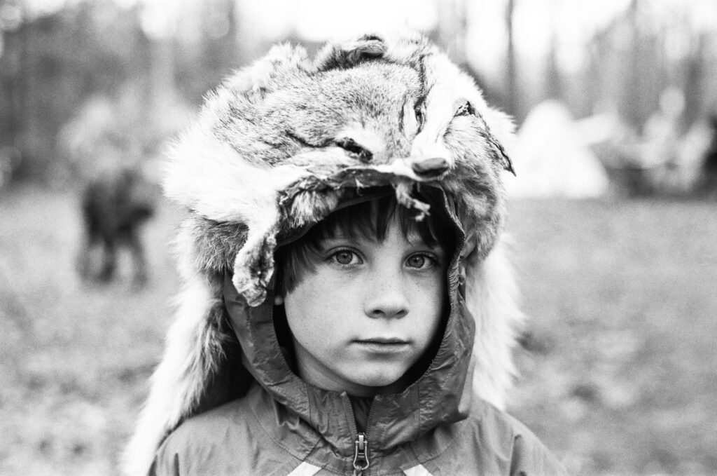Boy in fur hat