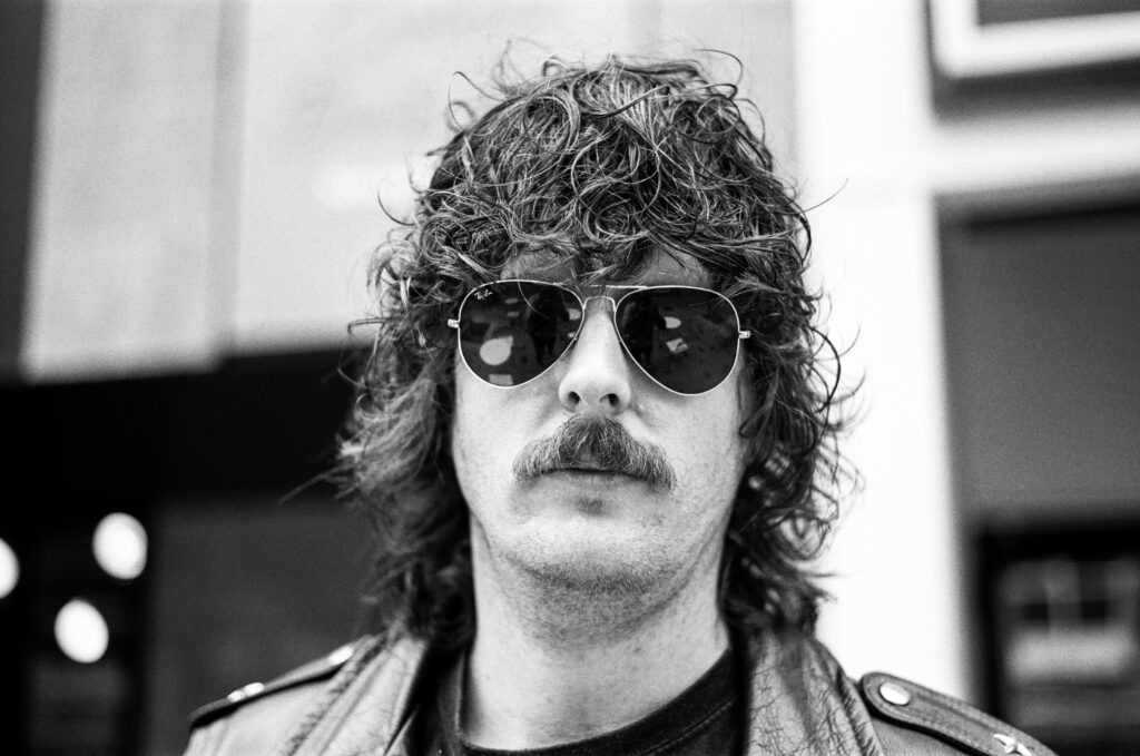 Man wearing aviator sunglasses