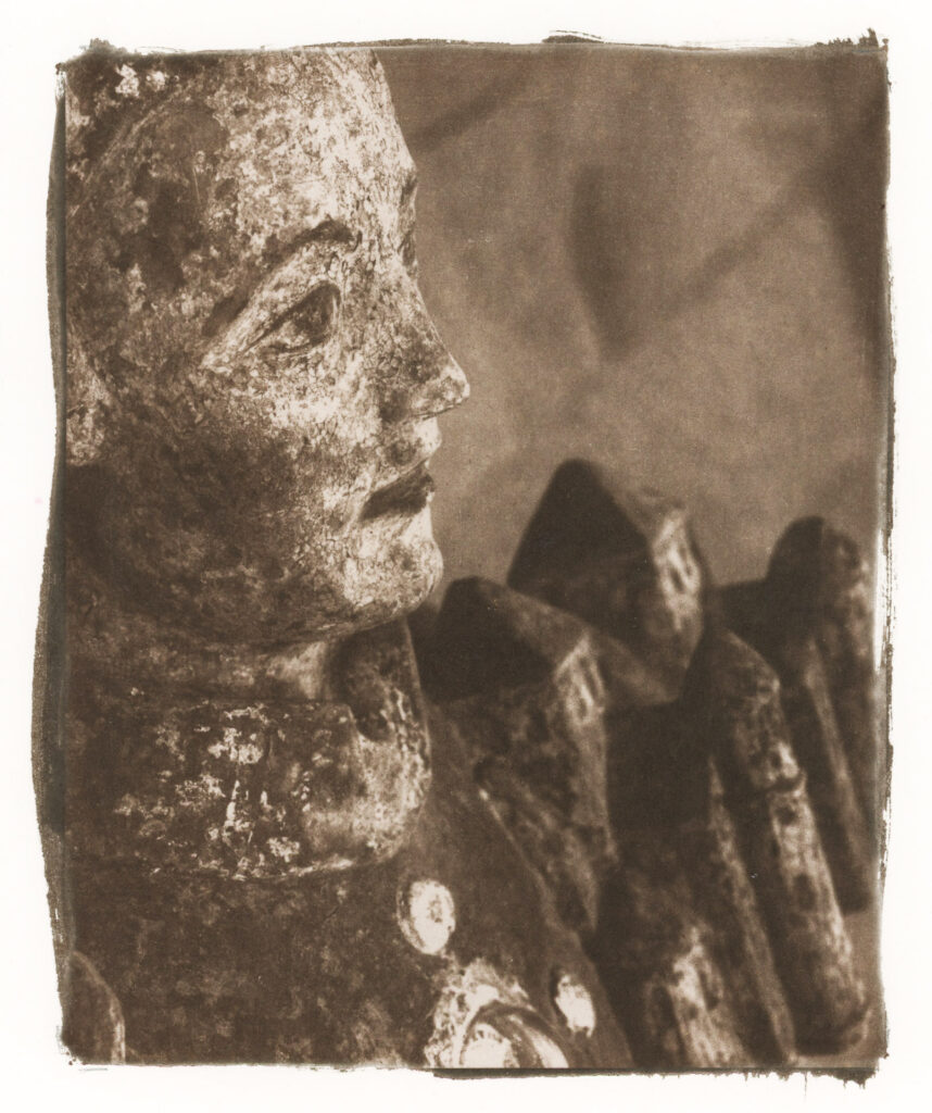 St. Bernward, founder and architect of St. Michael's, showing off his church on his tombstone.