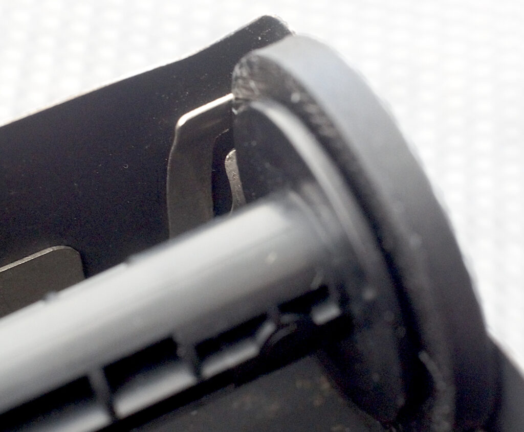Detail to show how the thickness of the 3D version prevents fully inserting the spool.