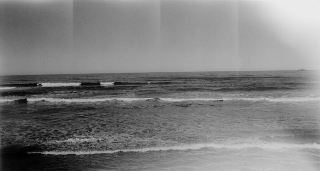 Surfing beach, St Claire - f11 plus 6x red filter.