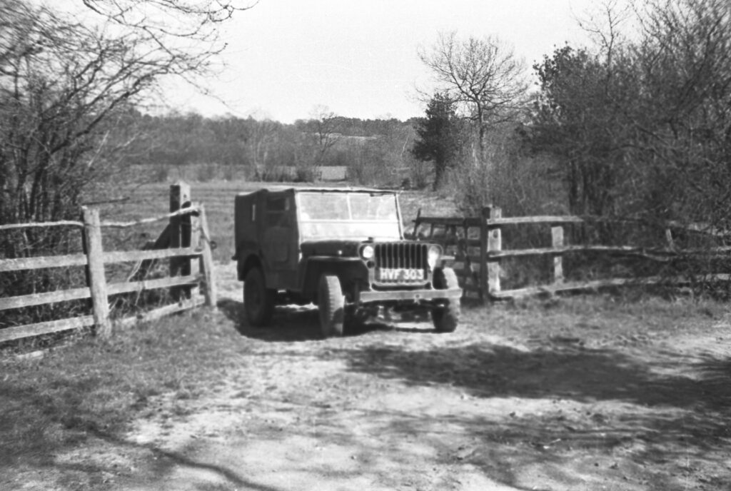 Old B&W image of a jeep.