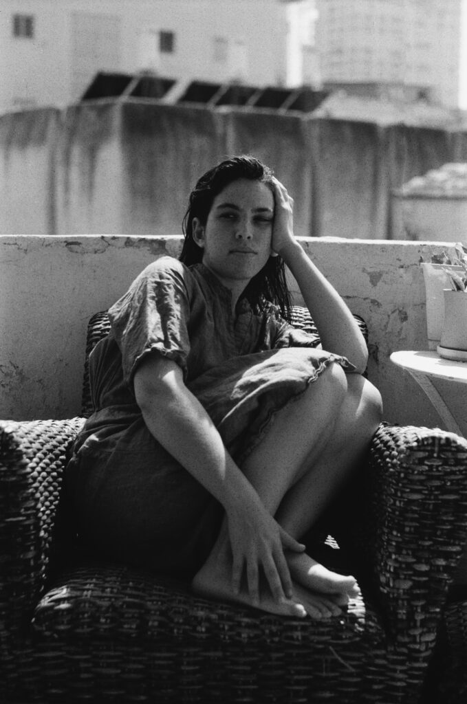 a woman sitting on a sofa