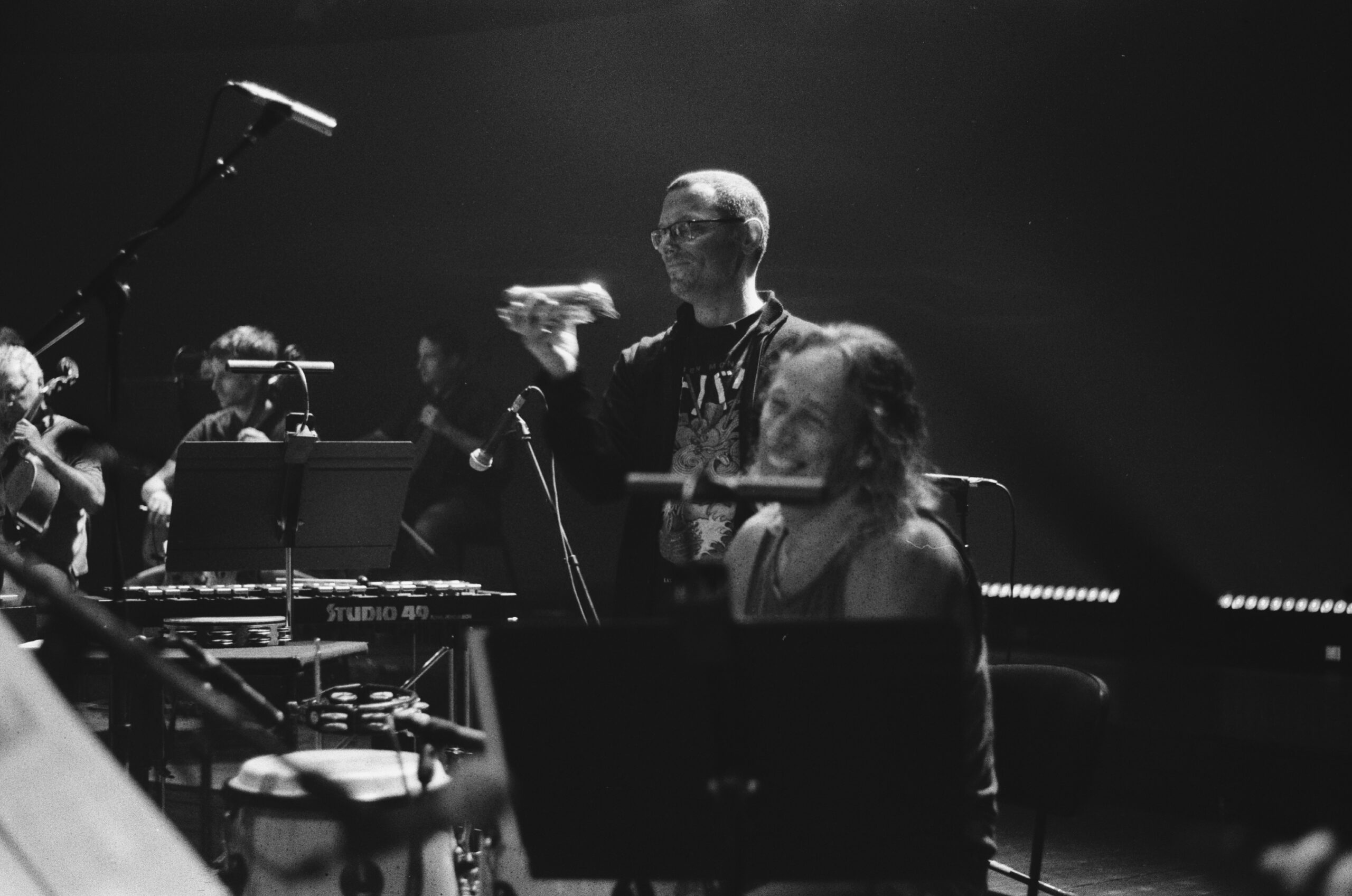 two people playing percussion instruments