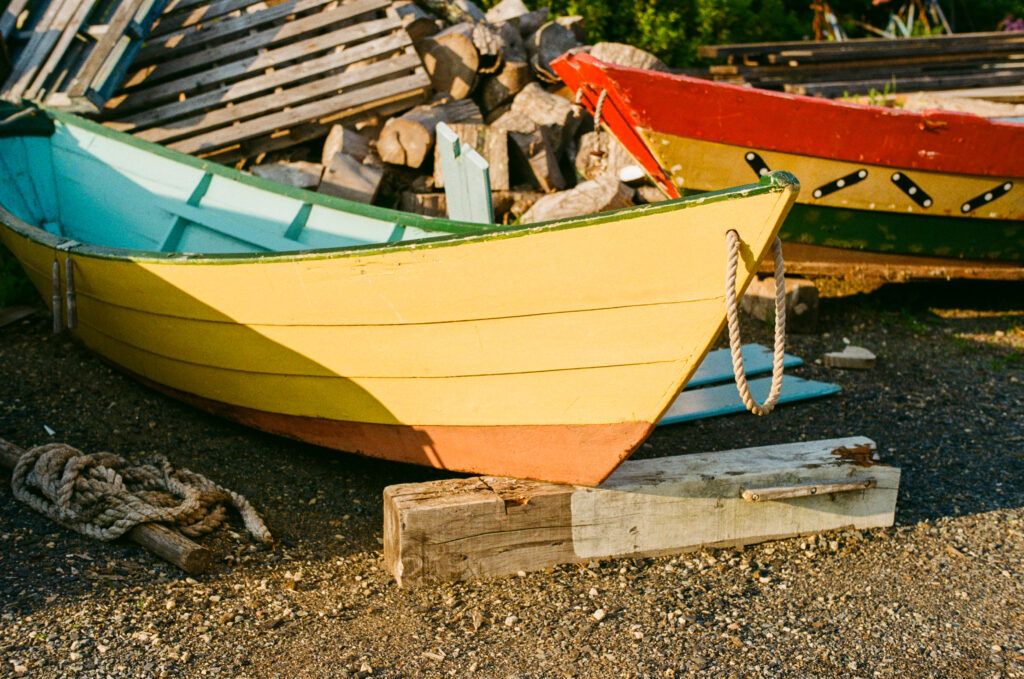 Two colourful rowboats