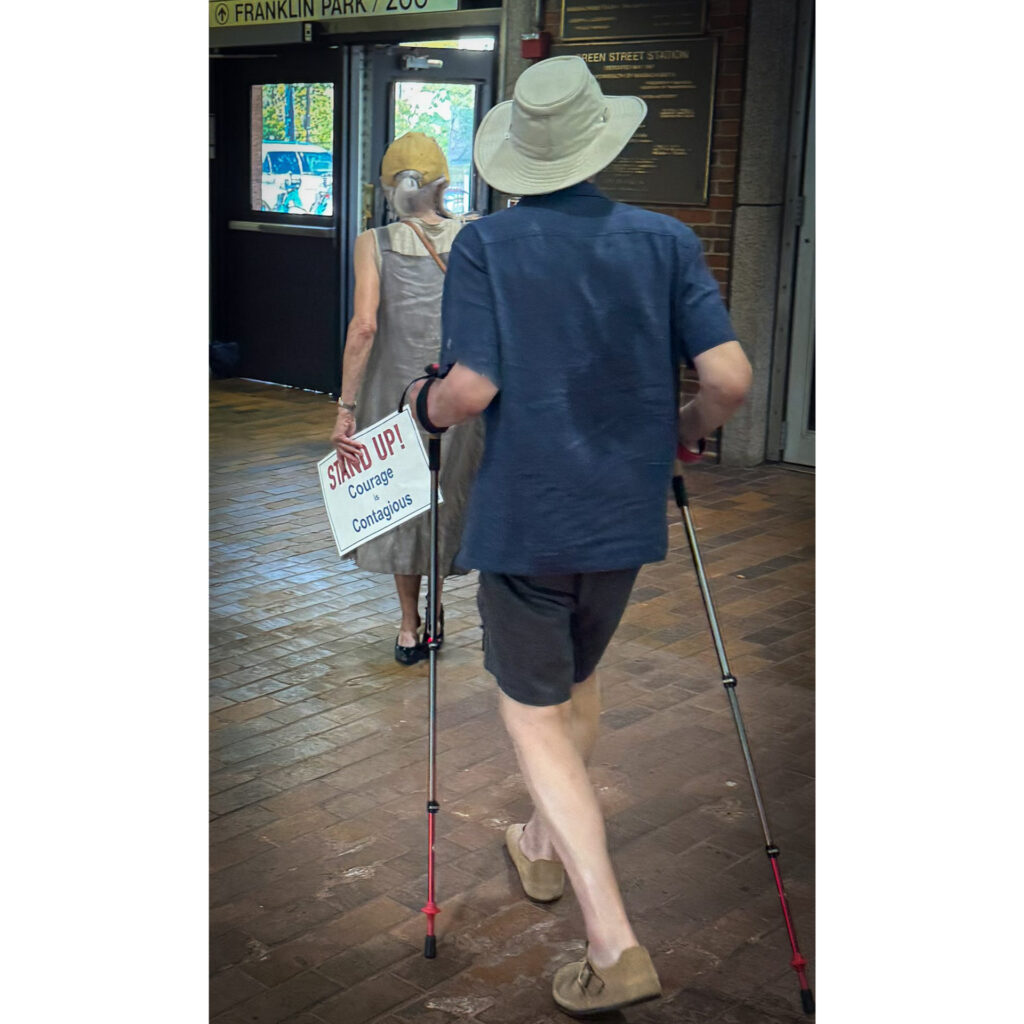 Photo of a couple leaving a Boston train station.