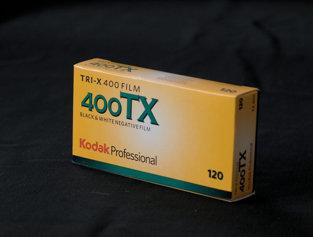 A box of Kodak Tri-X 400 120 5 pack photographed by Ted Smith Photography for his online store https://shop.tedsmithphotography.co.uk
