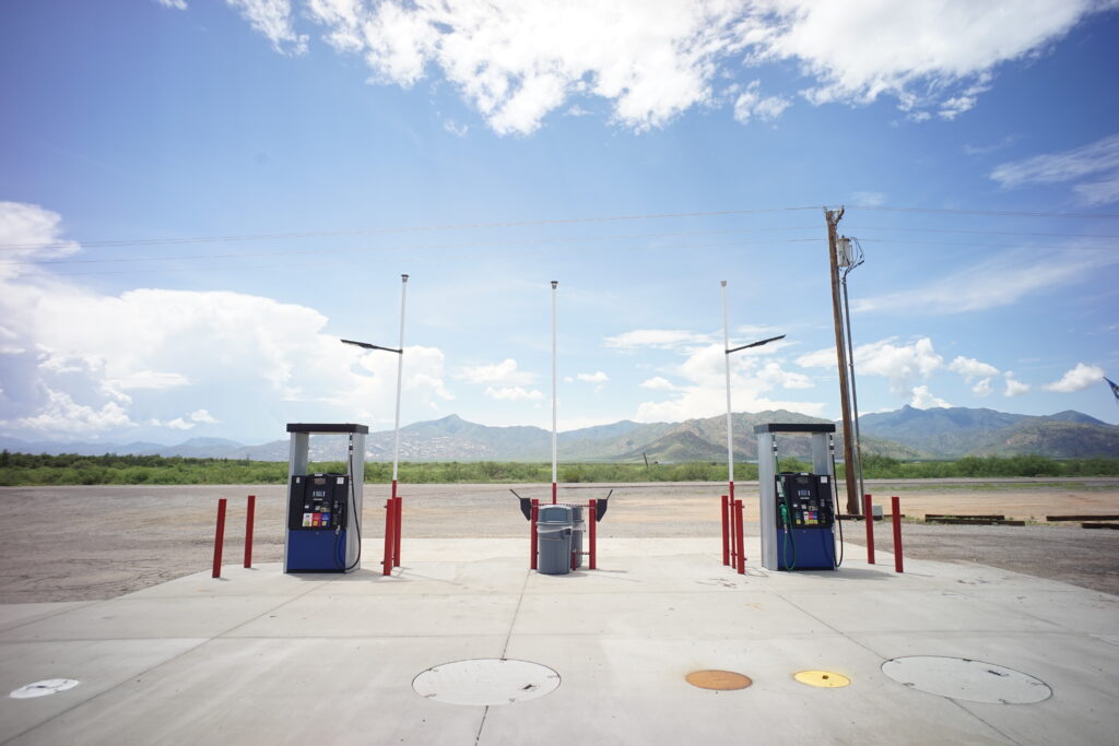 Gas pumps on a desert highway