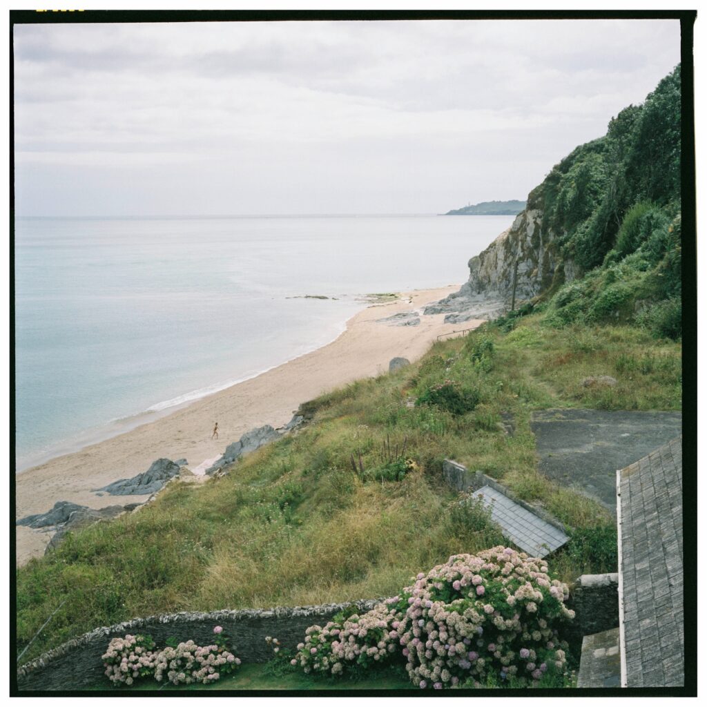 A view of Torcross beach, Devon, on a slightly overcast day.