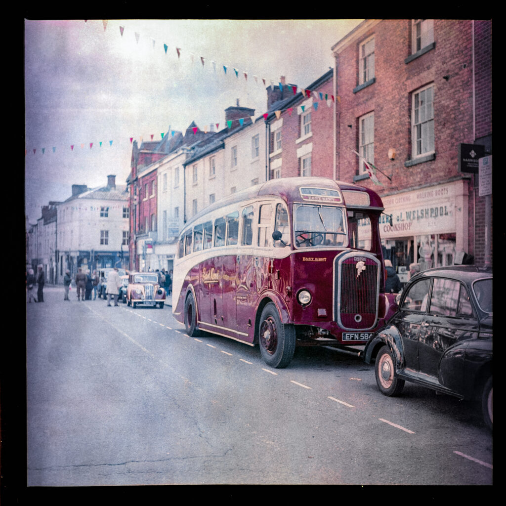 vintage bus on 1940s streetTaken with Yashica Mat EM and 47-year old Kodacolor 400 expired in 1997 rated at ISO12