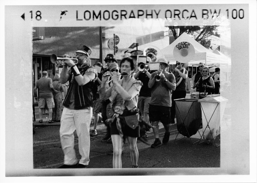Black and white photo of a marching band