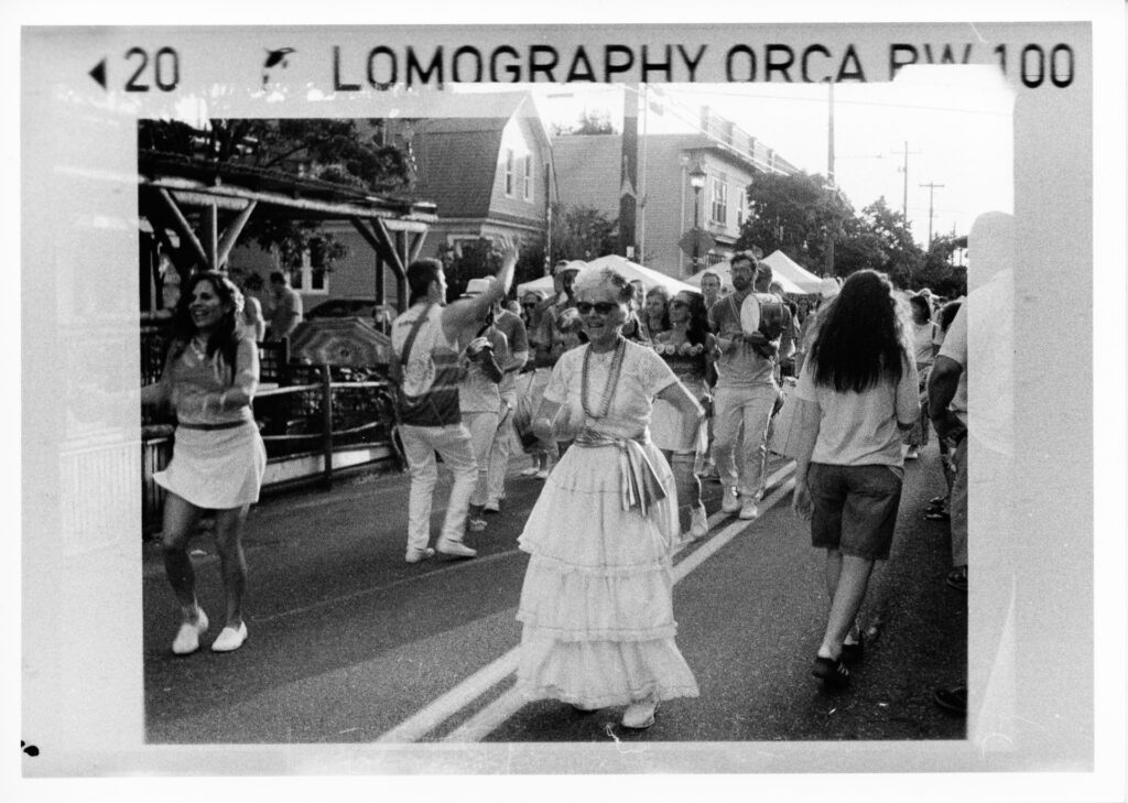 Black and white photo of a marimba band and dancers