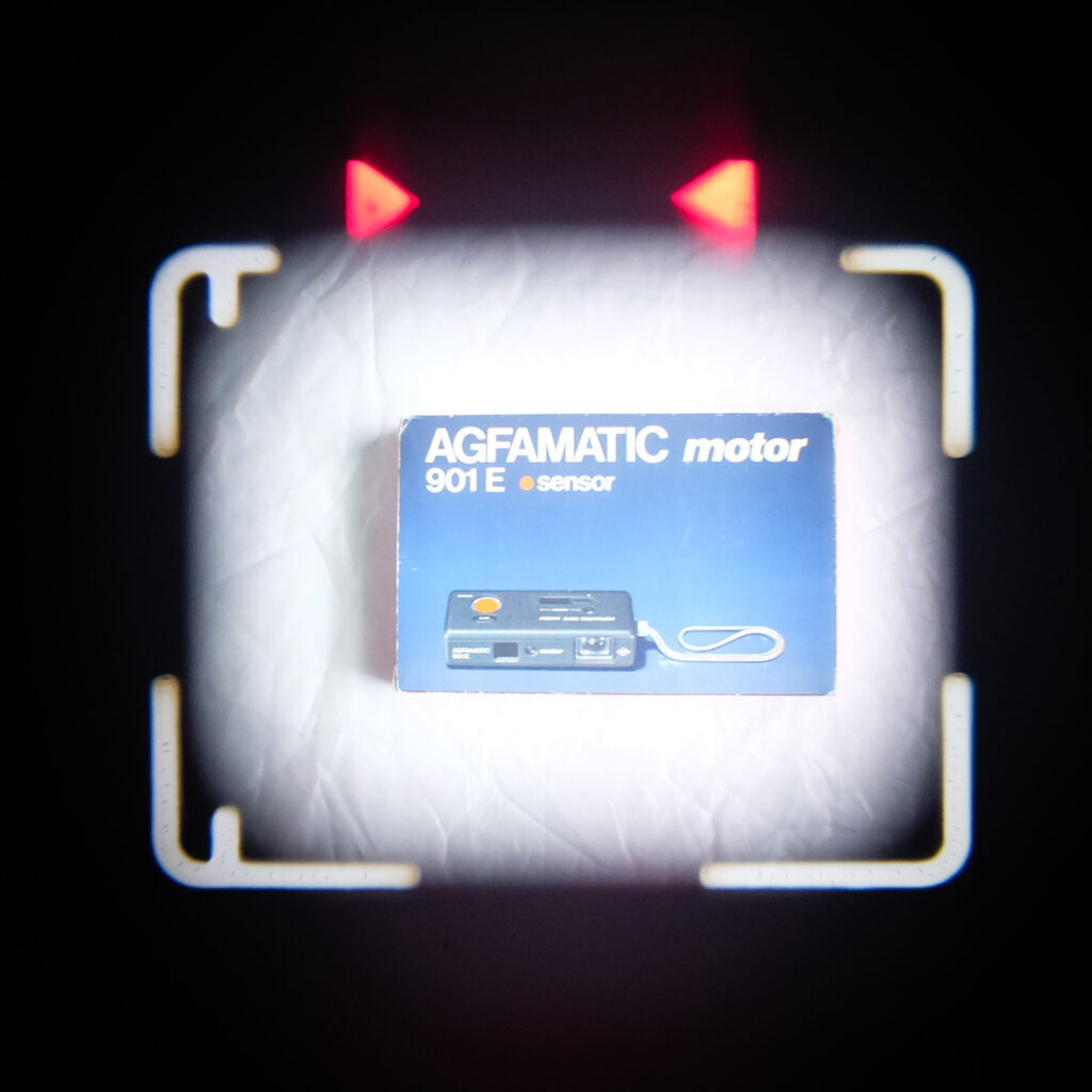 Looking through the viewfinder of a Agfa Agfamatic 901 E Motor