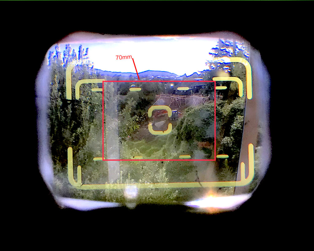The finder at 35mm zoom setting. I have overlaid the 70mm frame.