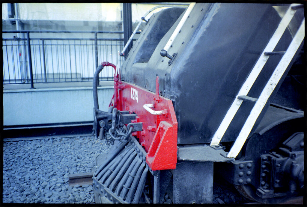 Buffer beam of same loco, photo taken through glass.
