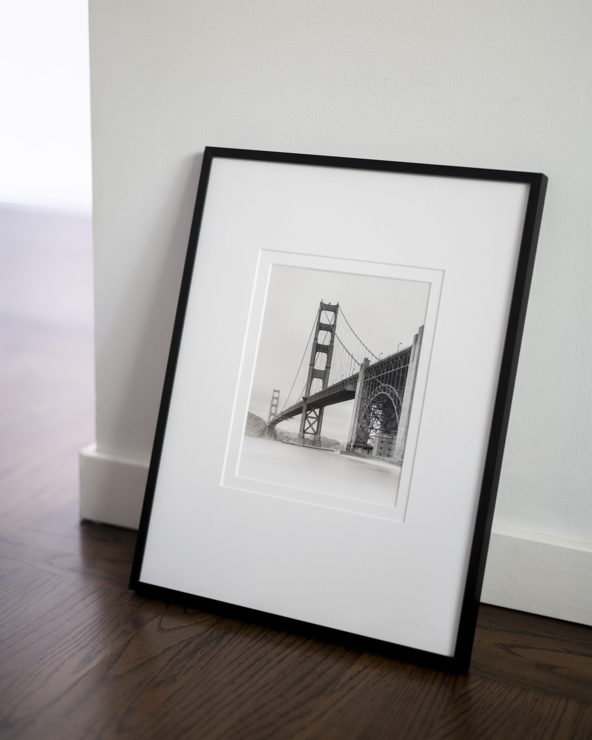 The final gelatin silver print, toned, matted, and framed.