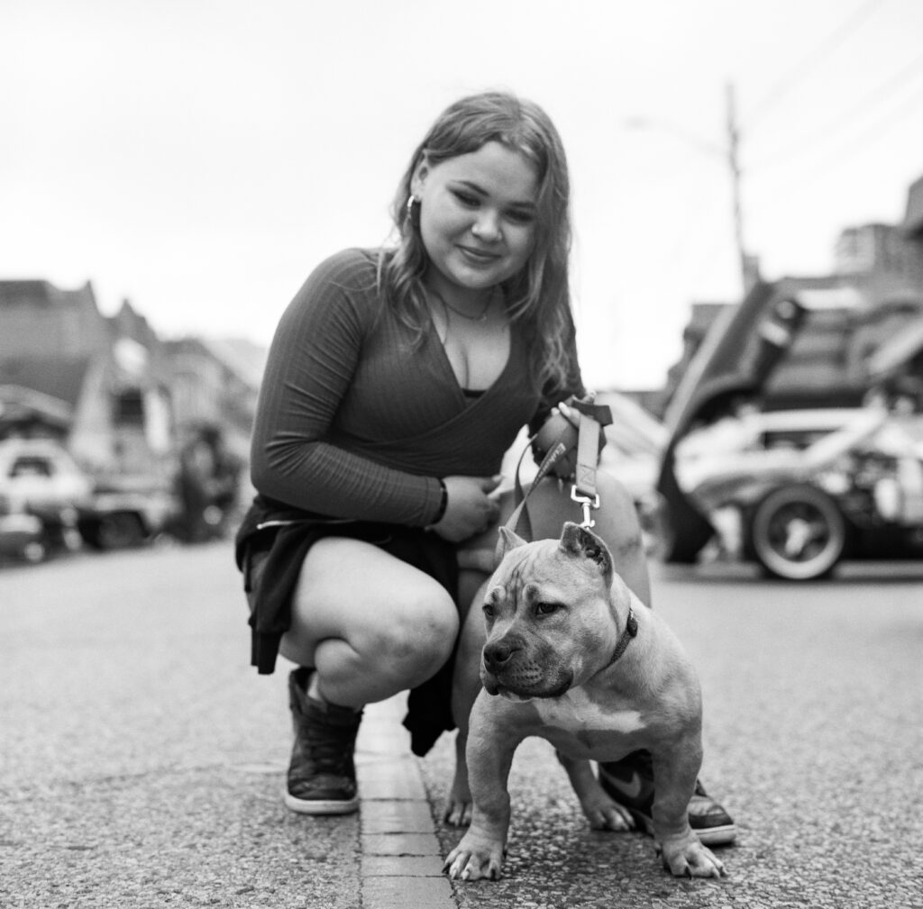 Young woman with American Pit Bull