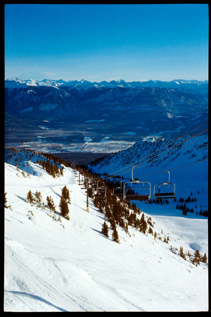 A photo of the chairlift and slopes of Crystal Bowl at Kicking Horse.
