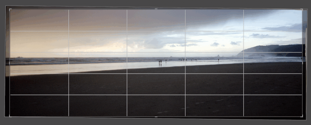 An image of a landscape photo in an image editor displaying a slight rotation, which cuts off a large amount of the frame on all sides.