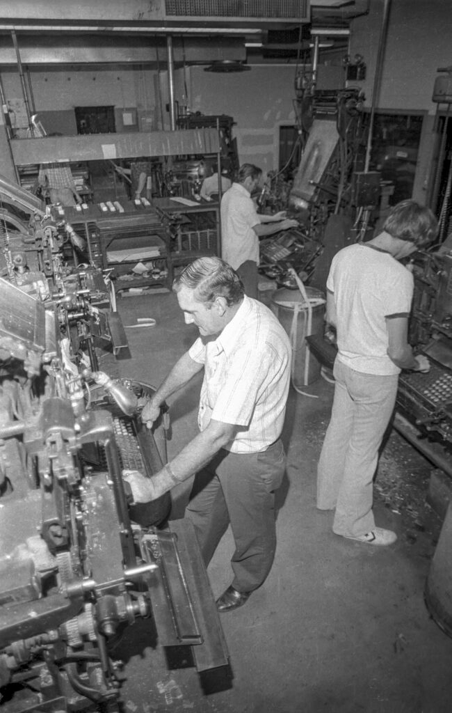 Linotype operators at their positions