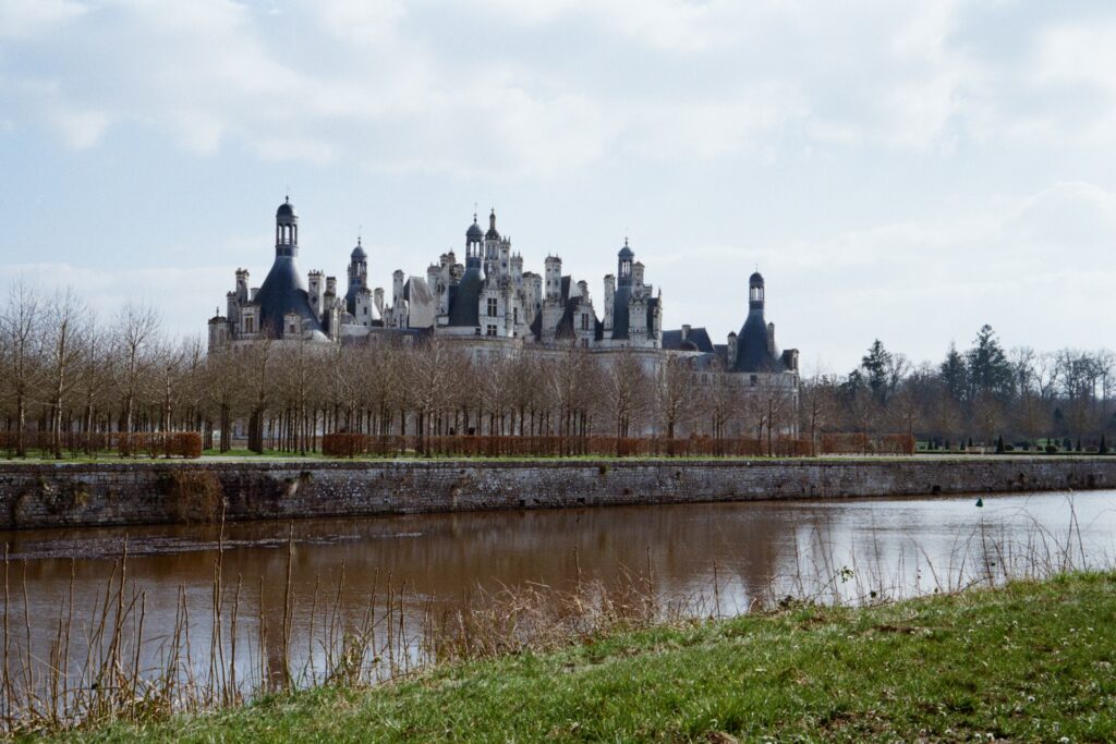 The Château de Chambord with the Cosson river in foreground