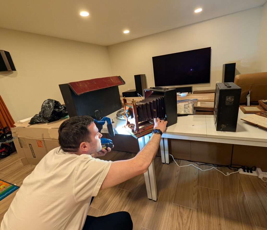 Marshall inspects Cirkut Camera parts