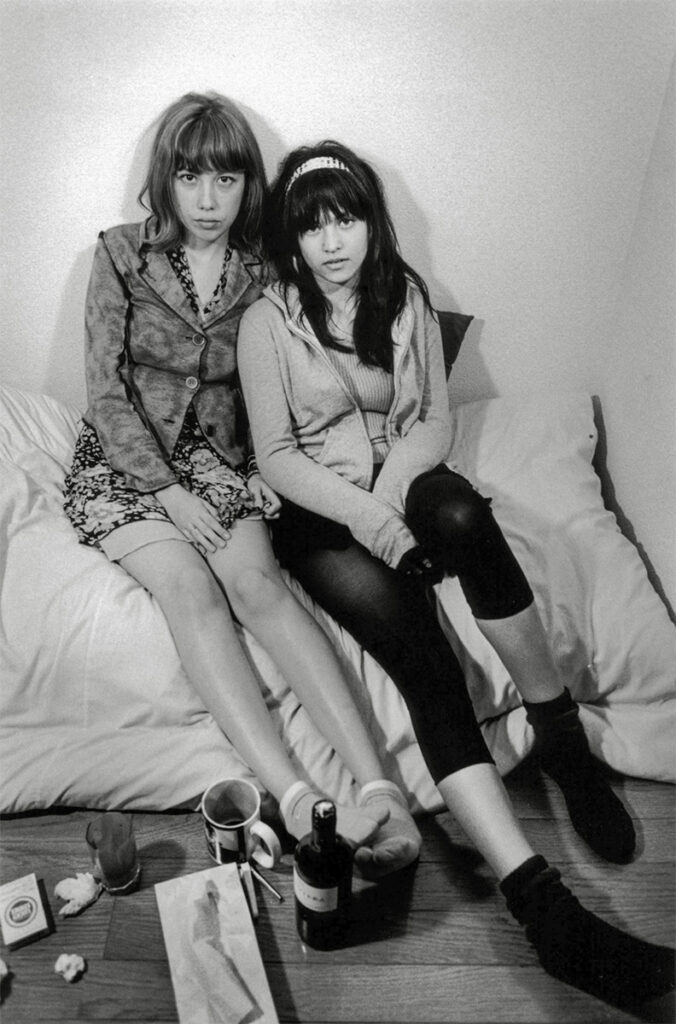 Chiaki and Paula. Photo taken with Nikon MF2n, Nikkor 21mm f2.8 lens and Kodak Tri-X 400 film.