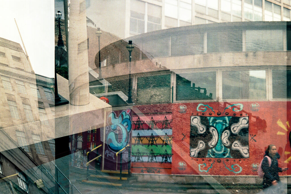 Double exposure featuring a Royal Mail building in Pimlico and view down to the Thames foreshore at low tide. 