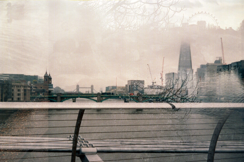 Double exposure on 35mm film featuring view from Millennium Bridge towards the east. Overlayed is a view from St James park of ducks in the lake and the London Eye.