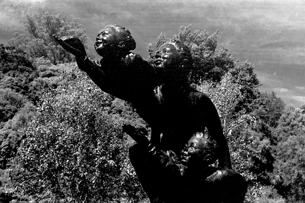 One of the Peter pan themed bronzes in Dunedin’s Botanic Gardens - Olympus/80S in 20ml, underexposed but emphasises the faces nicely.